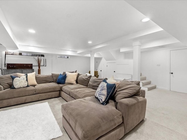 living area with light carpet, stairway, and recessed lighting