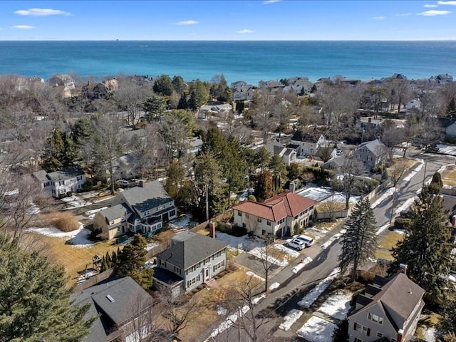 aerial view with a residential view and a water view