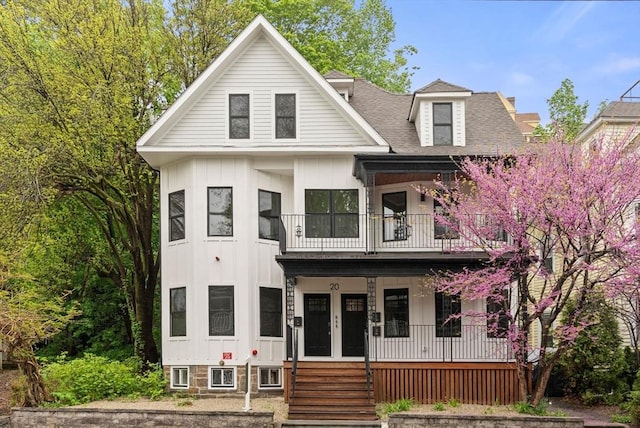 20 Boylston St Unit 3, Boston, MA 02130 - view of front of property featuring a balcony, covered porch, a shingled roof, and board and batten siding