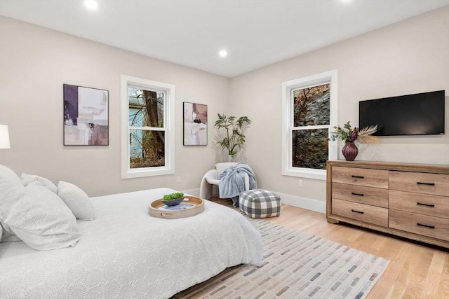 20 Boylston St Unit 3, Boston, MA 02130 - bedroom featuring light wood-style floors, recessed lighting, baseboards, and multiple windows