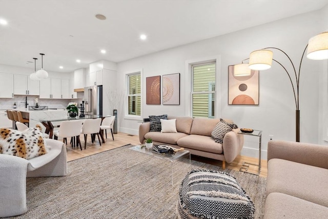 20 Boylston St Unit 3, Boston, MA 02130 - living room featuring baseboards, light wood-type flooring, and recessed lighting