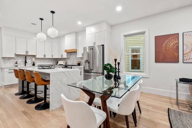 20 Boylston St Unit 3, Boston, MA 02130 - dining area featuring light wood finished floors, baseboards, and recessed lighting