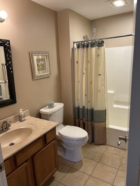 1 Hayloft Ln Unit 1, Marshfield, MA 02050 - full bath featuring vanity, tile patterned flooring, and shower / bath combo