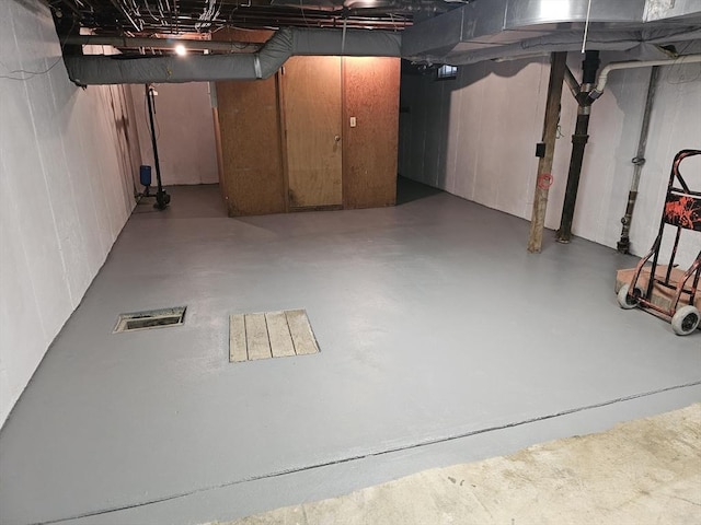 unfinished basement with visible vents