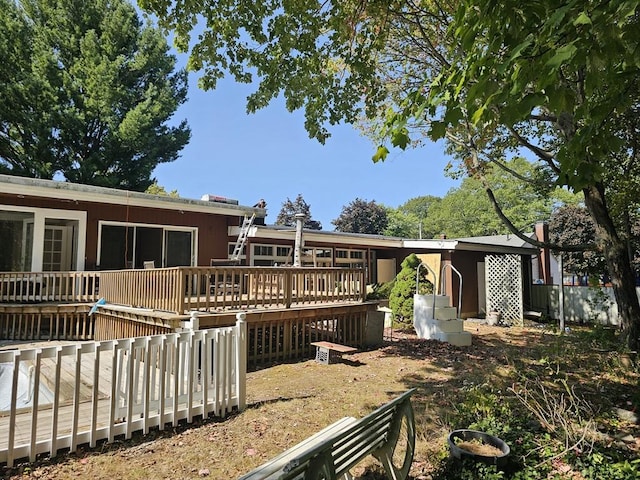 view of yard with a wooden deck