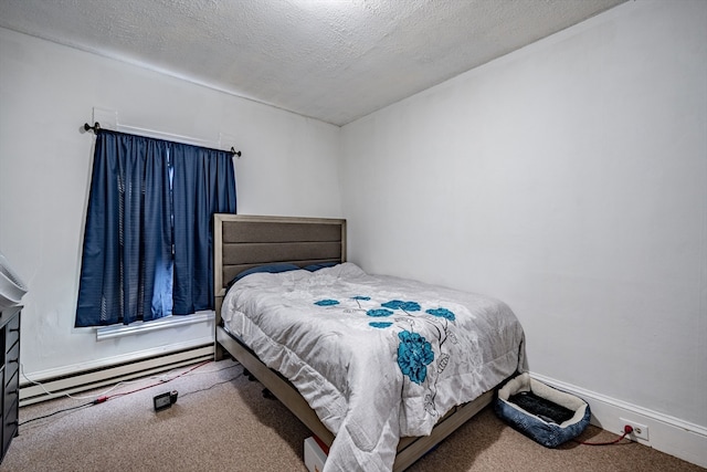 bedroom featuring carpet, a textured ceiling, and baseboard heating