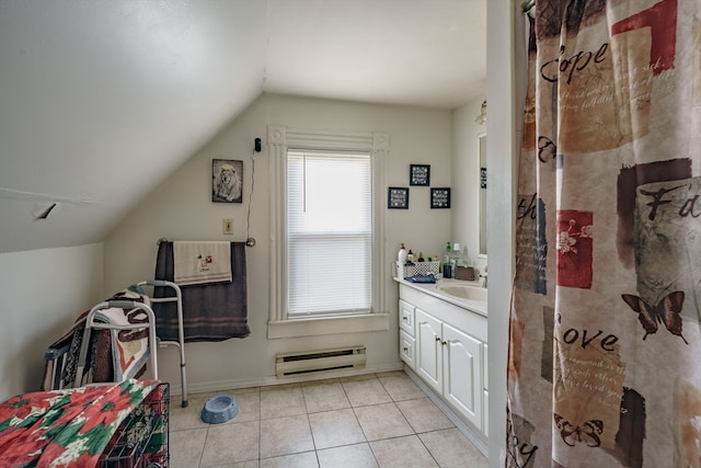 bathroom with tile patterned floors, vanity, baseboard heating, curtained shower, and lofted ceiling