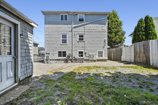 27 Whittier St, Fall River, MA 02724 - back of property featuring a patio