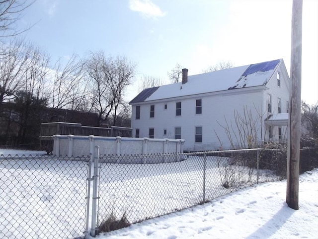 view of snow covered property