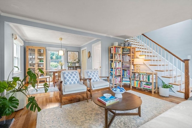 11 Netta Rd, Dedham, MA 02026 - living area featuring wood finished floors, crown molding, and stairs