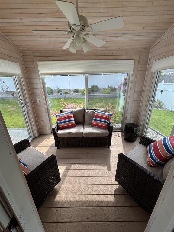 259 Gillette Ave, Springfield, MA 01118 - sunroom featuring vaulted ceiling, a ceiling fan, plenty of natural light, wood ceiling, and wooden walls