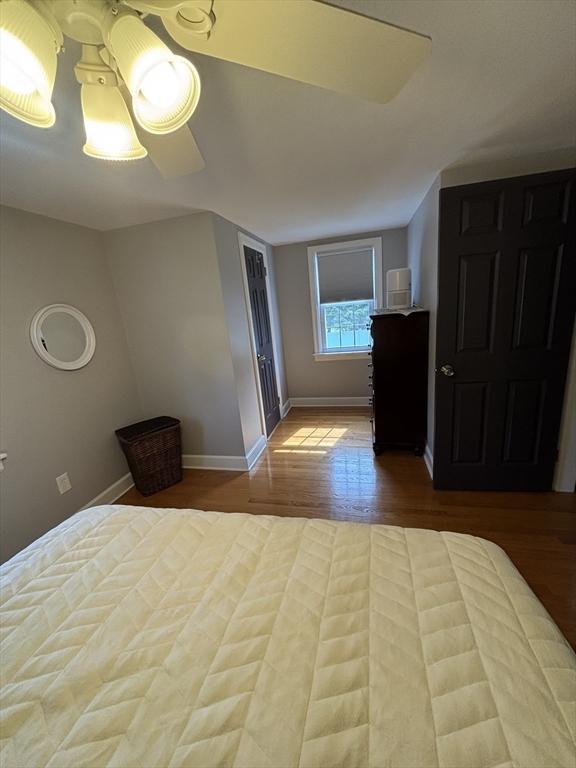 259 Gillette Ave, Springfield, MA 01118 - unfurnished bedroom with wood finished floors and baseboards