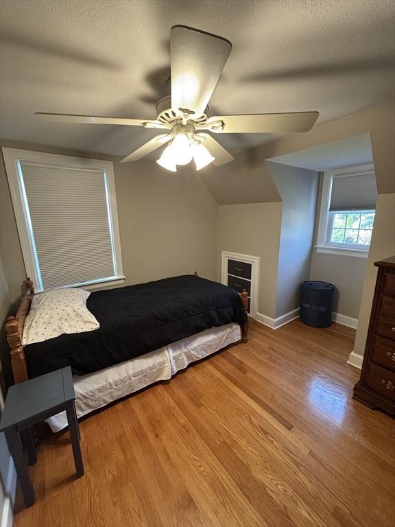 259 Gillette Ave, Springfield, MA 01118 - bedroom with wood finished floors, baseboards, and a ceiling fan