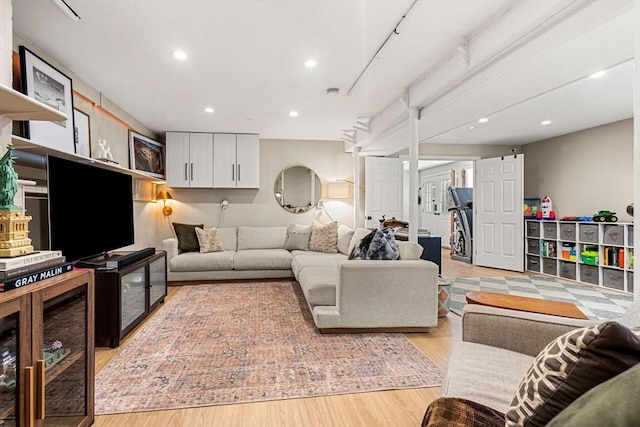 living area featuring recessed lighting and light wood-style flooring