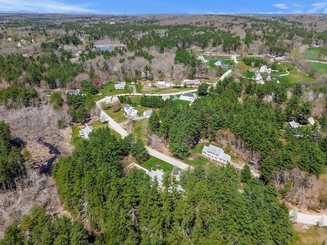 drone / aerial view with a view of trees
