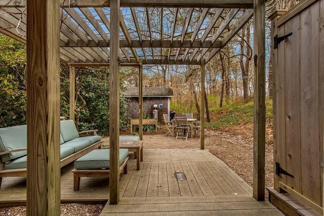 82 Shore Rd Unit 9, Truro, MA 02652 - wooden terrace with a pergola, an outbuilding, and outdoor lounge area