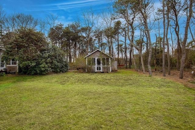 82 Shore Rd Unit 9, Truro, MA 02652 - view of green lawn featuring an outdoor structure