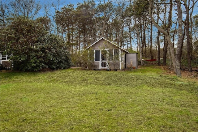 82 Shore Rd Unit 9, Truro, MA 02652 - view of grassy yard with an outdoor structure