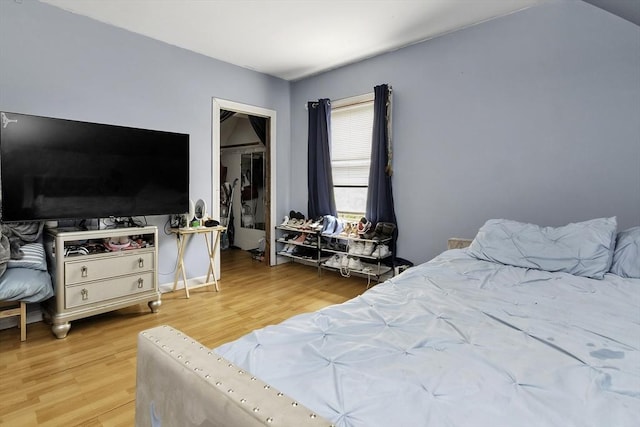 bedroom with wood finished floors