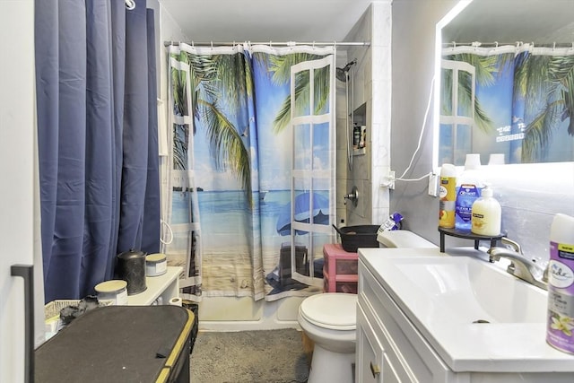 bathroom with toilet, vanity, and a shower with shower curtain