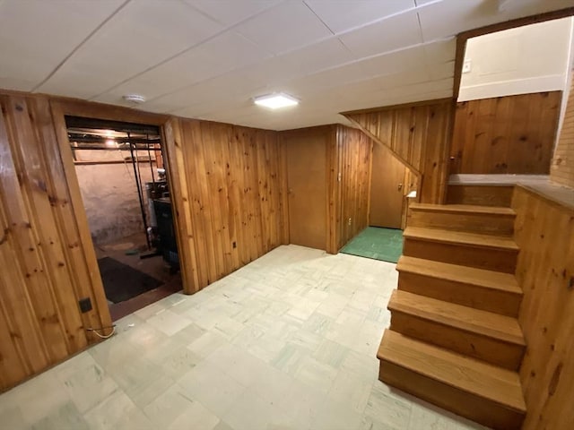 295 Atlantic, Quincy, MA 02171 - finished basement featuring wooden walls, stairway, and light floors