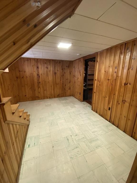 295 Atlantic, Quincy, MA 02171 - bonus room featuring wooden walls, light flooring, and stairs