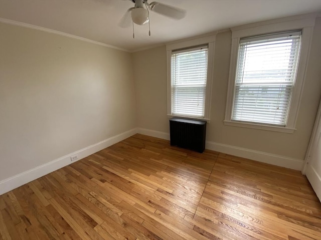 295 Atlantic, Quincy, MA 02171 - unfurnished room with ornamental molding, light wood-style flooring, and ceiling fan
