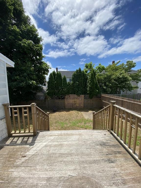 295 Atlantic, Quincy, MA 02171 - wooden terrace with a fenced backyard