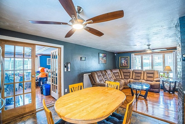 214 Hovenden Ave, Brockton, MA 02302 - dining space with ceiling fan, wood finished floors, and a textured ceiling