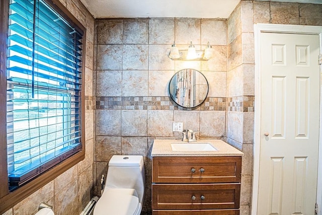214 Hovenden Ave, Brockton, MA 02302 - bathroom with vanity and tile walls
