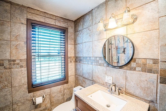214 Hovenden Ave, Brockton, MA 02302 - bathroom featuring tile walls and vanity