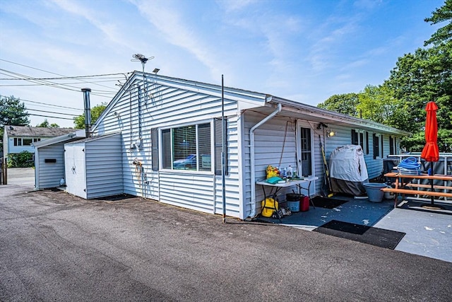214 Hovenden Ave, Brockton, MA 02302 - view of front of property featuring a patio area