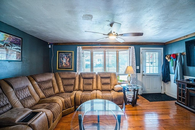214 Hovenden Ave, Brockton, MA 02302 - living area with hardwood / wood-style flooring, a ceiling fan, and a textured ceiling