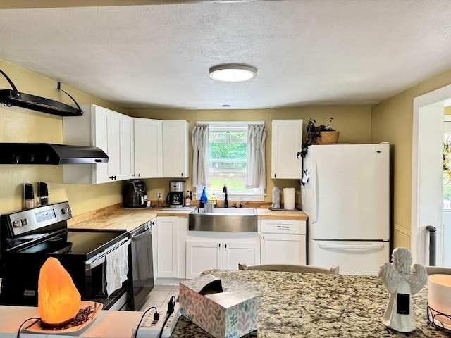 169 Beauchamp Ter, Chicopee, MA 01020 - kitchen featuring appliances with stainless steel finishes, white cabinets, and a textured ceiling