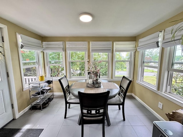 169 Beauchamp Ter, Chicopee, MA 01020 - dining area featuring healthy amount of natural light and light tile patterned floors