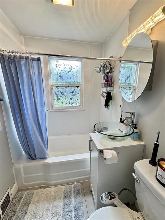 169 Beauchamp Ter, Chicopee, MA 01020 - full bathroom with shower / tub combo with curtain, plenty of natural light, and vanity