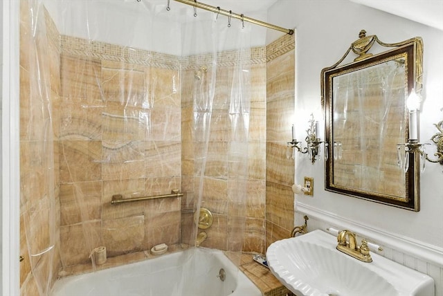 338 Harvard St Unit 1, Cambridge, MA 02139 - full bathroom featuring a sink and shower / bath combo with shower curtain