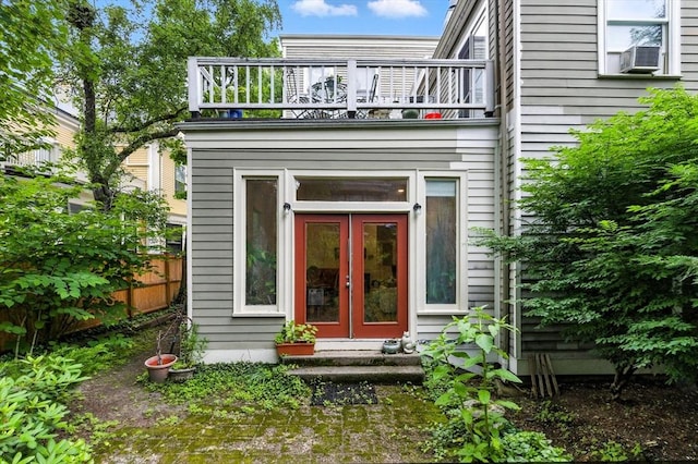 338 Harvard St Unit 1, Cambridge, MA 02139 - doorway to property with a balcony, french doors, and cooling unit