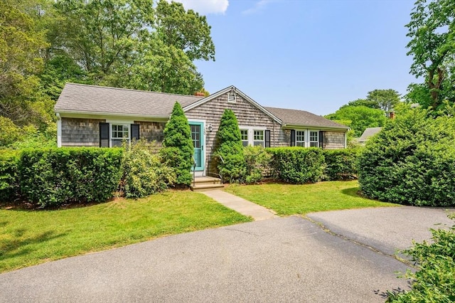view of front of home with a front yard