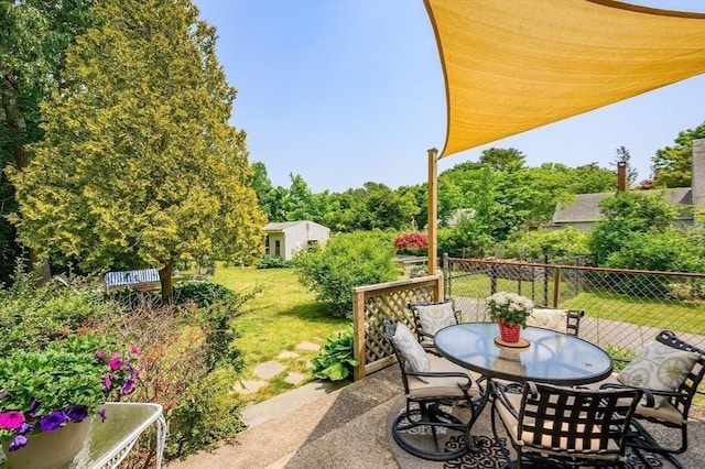 view of patio / terrace with fence and outdoor dining area