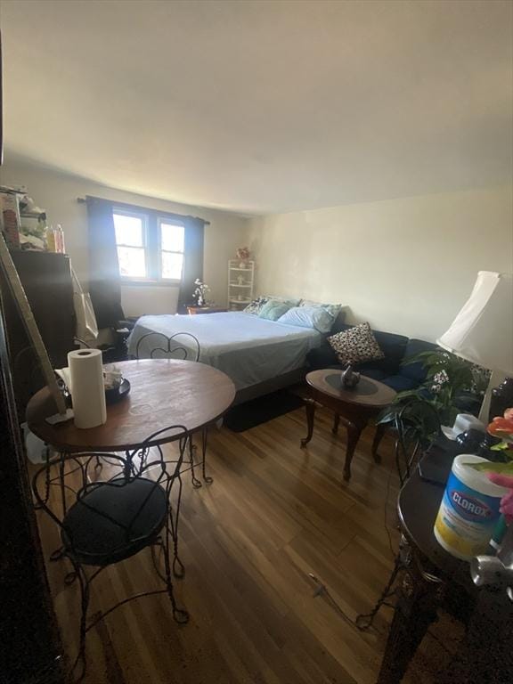 bedroom featuring wood finished floors