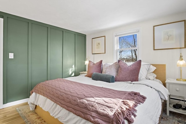 bedroom with light wood-type flooring