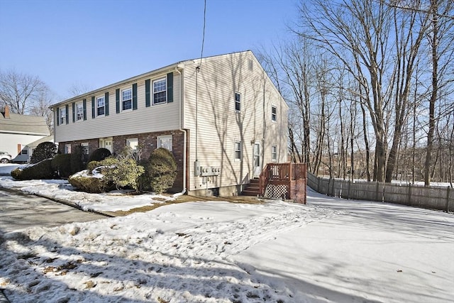 view of snow covered property