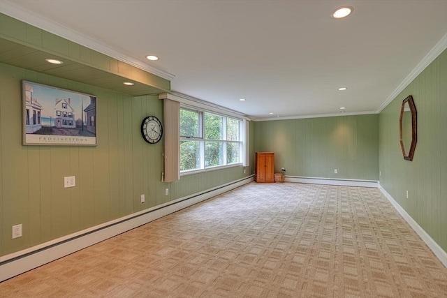 carpeted spare room featuring crown molding, baseboard heating, recessed lighting, and baseboards