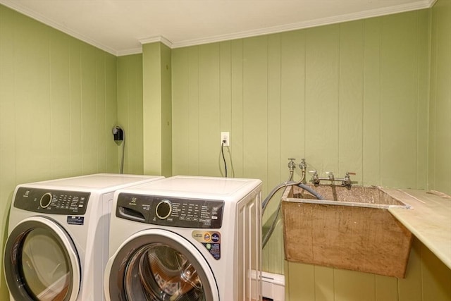 laundry room featuring independent washer and dryer and ornamental molding