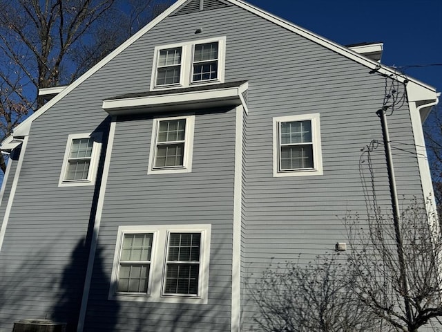 view of home's exterior featuring central AC unit