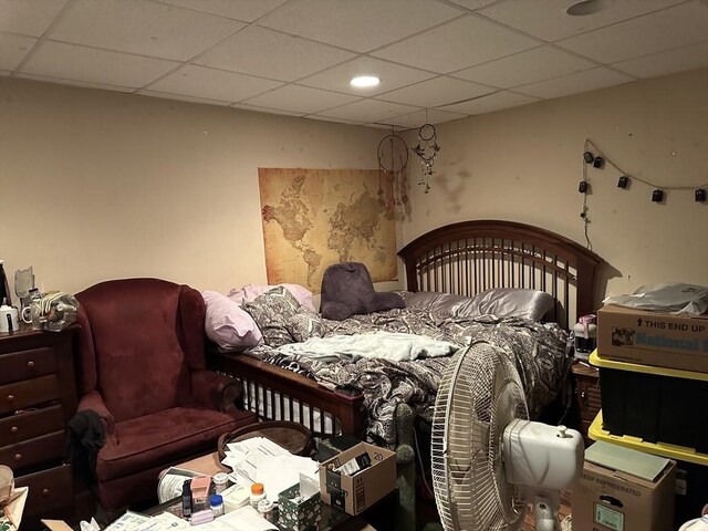 bedroom featuring a drop ceiling