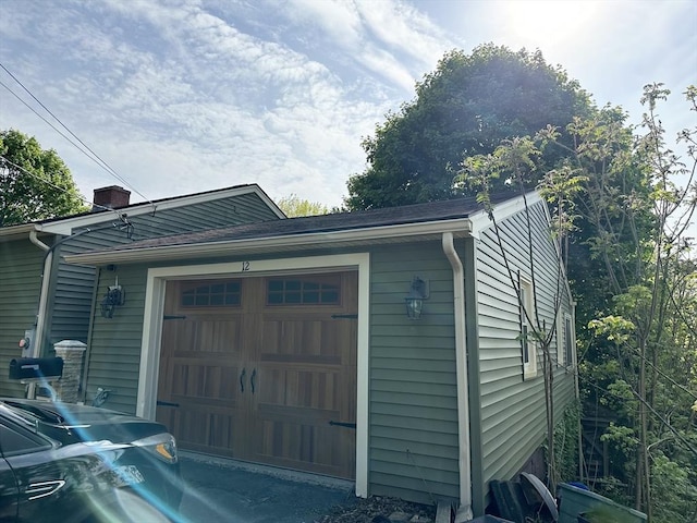 view of side of property with a chimney