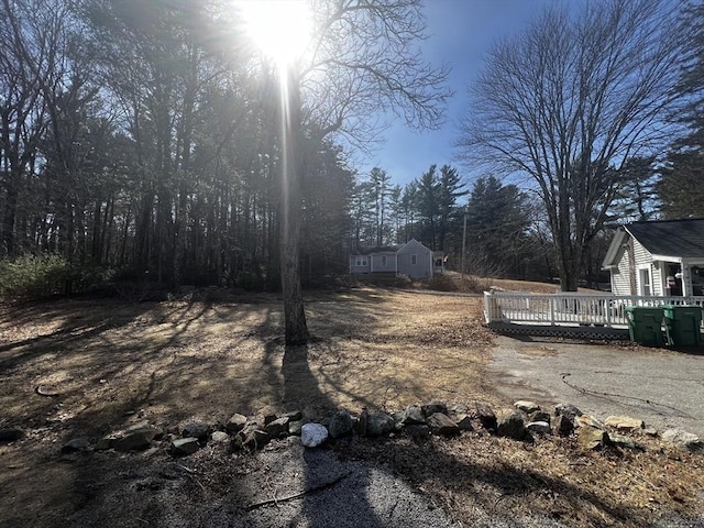 view of yard with a deck