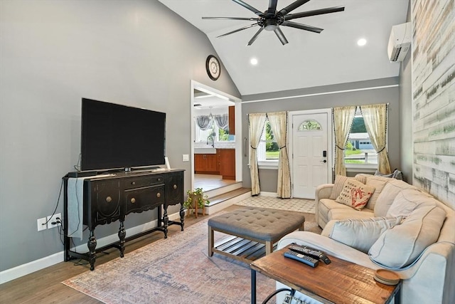 683 Rogers Ave, West Springfield, MA 01089 - living room featuring a wall mounted air conditioner, a ceiling fan, light wood-type flooring, recessed lighting, and high vaulted ceiling